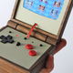 Illustration for article titled Portable Gaming Has Never Been as Beautiful as this Handheld Wooden Emulator